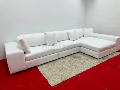 Like new condition eichholtz brand white color lshape sofa