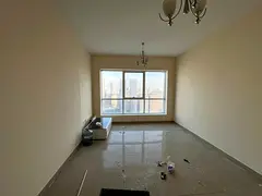 One bedroom and living room for rent in Al Taawun, with parking and balcony.
