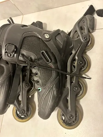 Mens black inline roller skates - size approx. EU 42 (used)