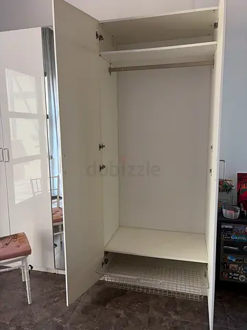 White 4-Door Wardrobe with Center Mirror - Good Condition