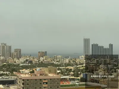 أرقى وأشيك غرفتين وصالة مع 2 حمام تكييف مركزى | بلكون باطلالة بحرية صيانه كامله علي المالك طول فترة الايجار قريب من جميع المخارج لدبي والشارقة00