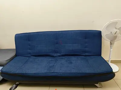 Blue fabric futon sofa bed, gently used