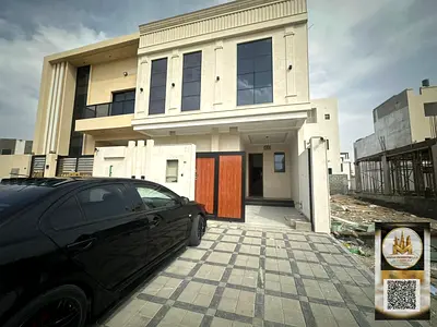 Townhouse for sale in Al Zahia, Ajman. 4 master bedrooms, 5 bathrooms, living room, 2 lounges, maid's room, roof terrace. Electricity and water includ