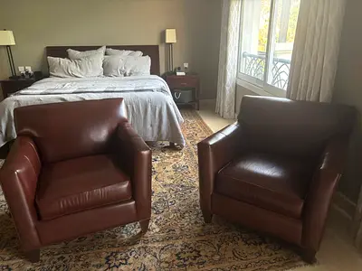 Crate and Barrel Pair of Brown Leather Armchairs in Good Condition