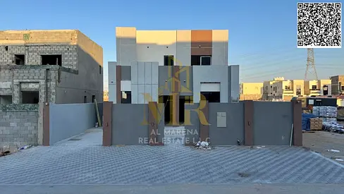 Two-story villa with a roof terrace, price includes registration and ownership fees, in one of Ajman's most prestigious areas. Freehold ownership avai