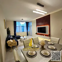 Luxurious and beautiful fully furnished two-bedroom apartment for monthly rent in Ajman, including a