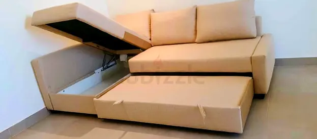 IKEA L shap Sofa store cum bed you can fix the storage lift or Right