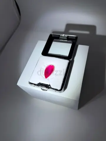 Natural pink pear-shaped gemstone (loose) in display box