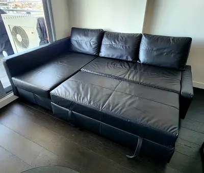 Black Leather Convertible Sofa Bed — Left Chaise, Good Condition