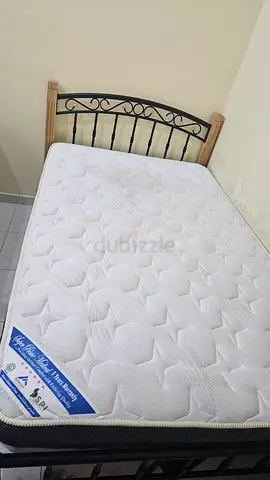 Single metal frame bed with mattress - good condition