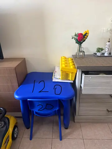 Kids blue plastic activity table with chair and storage bin