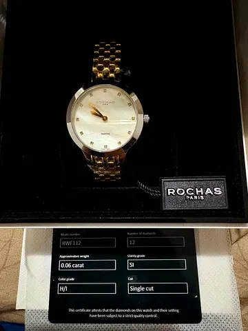 Luxury Rochas Paris womens two-toned watch with diamonds and pearl face