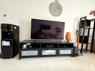 50-55 inch LG UHD TV on stand with soundbar and subwoofer (used)