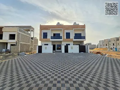 Villa for sale in Ajman, including registration, water, and electricity.