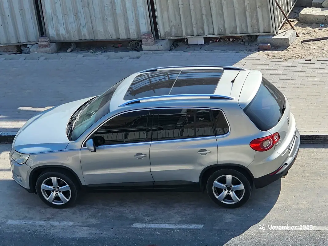 Volkswagen Tiguan 2009 — photo 1 of 8