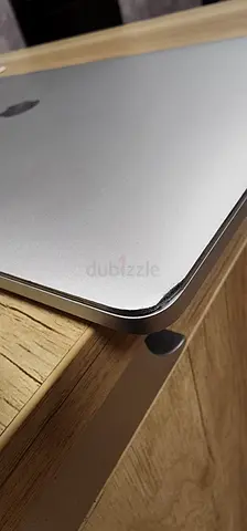 Apple MacBook Pro (Silver) - Used, Good Condition - Slight bump on one corner, rest all good.