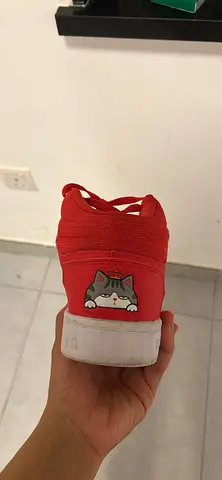 Red kids backpack with cute cat patch — good used condition