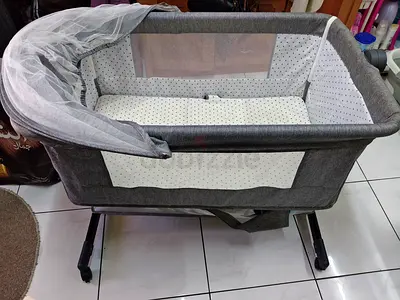 Gray Portable Baby Bassinet with Mosquito Net and Storage (Good Condition)