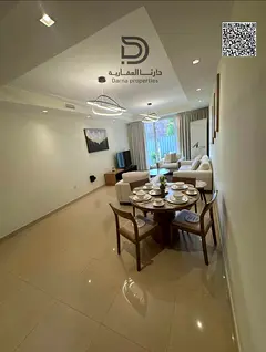 Own a 2-bedroom apartment with sea view in B2 Tower, just 1% monthly, free AC, prime location, and u