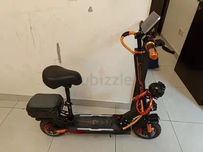kugoo m4 pro with Seat — Foldable Commuter Scooter (Black/Orange)