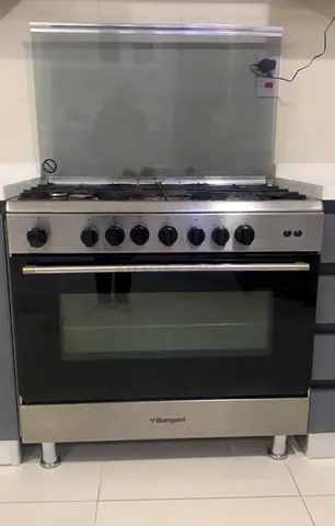 Bompani Stainless Steel Gas Range with Oven - Good Condition