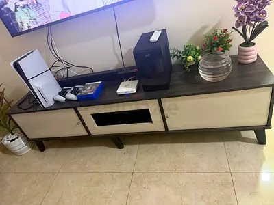 Modern low TV cabinet with storage - light wood finish