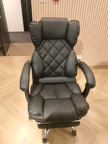 Comfortable Black Leather Executive Office Chair with Footrest