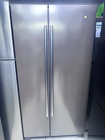 Large stainless steel side-by-side refrigerator, good condition