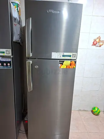 Double-door stainless steel refrigerator - good working condition