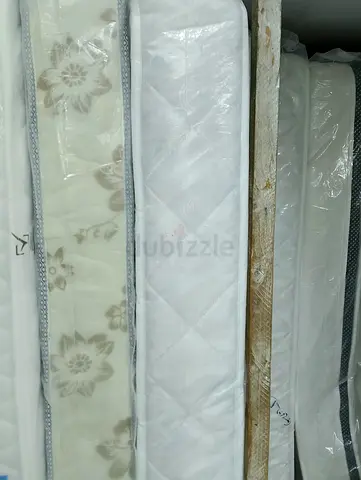 Set of assorted single mattresses — new/unused, various thicknesses