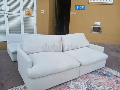 Swin feather 🪶 filled modular sofa with footstool