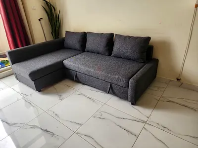 Frihiten Grey L-shaped sectional sofa bed