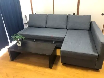 Grey L-shaped Sofa bed with Storage Chaise - Good Condition