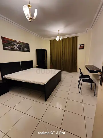 Family master bedroom available in near Mankool golden sands 3 abc 1 building