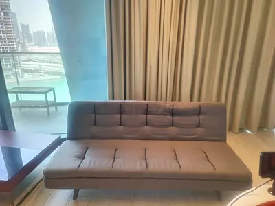 Gray Convertible Sofa Bed — Compact 2-Seater, Good Condition