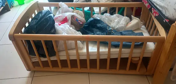 Baby crib in excellent condition. Comes with free stuffs