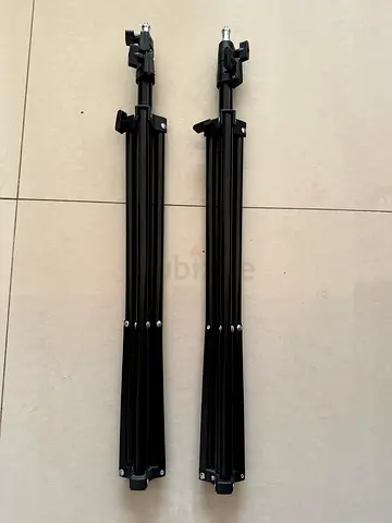 Pair of adjustable light stands / tripods - foldable studio stands