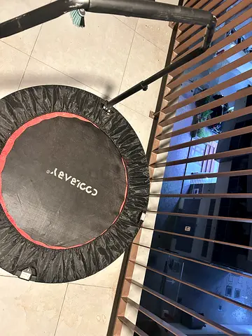 Mini rebounder trampoline with safety bar - good condition