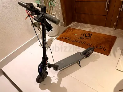 Electric scooter with modified suspension