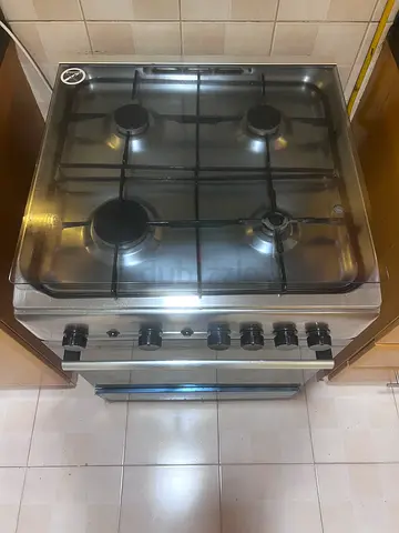 Stainless Steel 4-Burner Gas Cooker with Oven - Good Working Condition