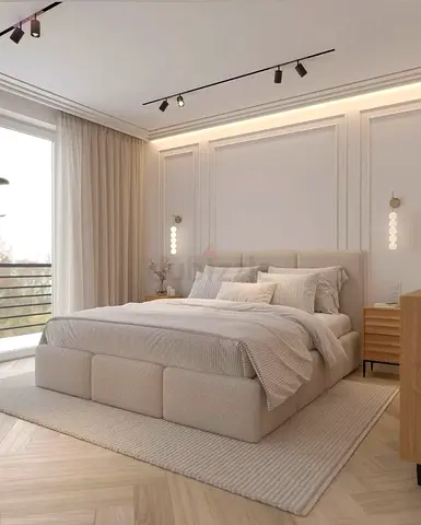 Modern upholstered king bed with neutral rug and bedside tables — ready to move