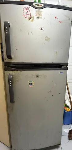 Used double-door refrigerator (top freezer) - needs cleaning, working condition