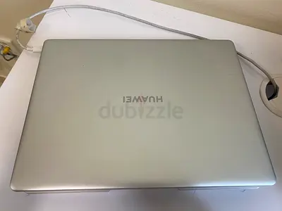 Huawei Silver Laptop -  Matebook 13 . Not Used that much , Perfect Condition