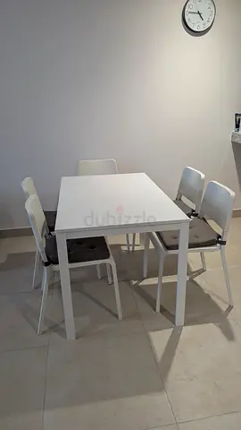 IKEA White Extendable Dining Table with 5 Cushioned Chairs