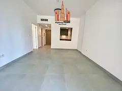 Modern luxurious 1bhk Semi Close Kitchen in Aljada Community