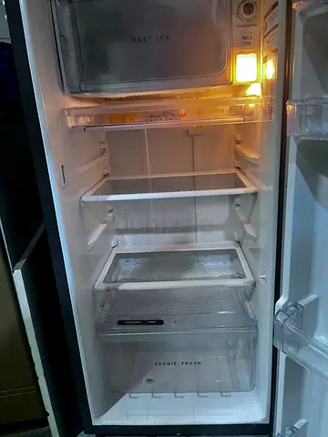 Used Single-Door Refrigerator with Freezer Compartment - Good Working Condition.