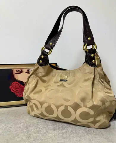 Preowned Coach Madison Op Art Sateen Maggie Shoulder Bag.