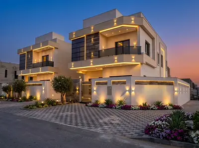 Corner villa for sale in Ajman, Al Helio 2 area, including registration fees and close to all services.
