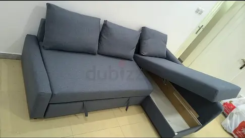 Ikea L Shape Sofa cum bed with big storage in L