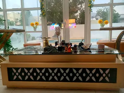 Modern Glass Top Coffee Table with Decorative Base